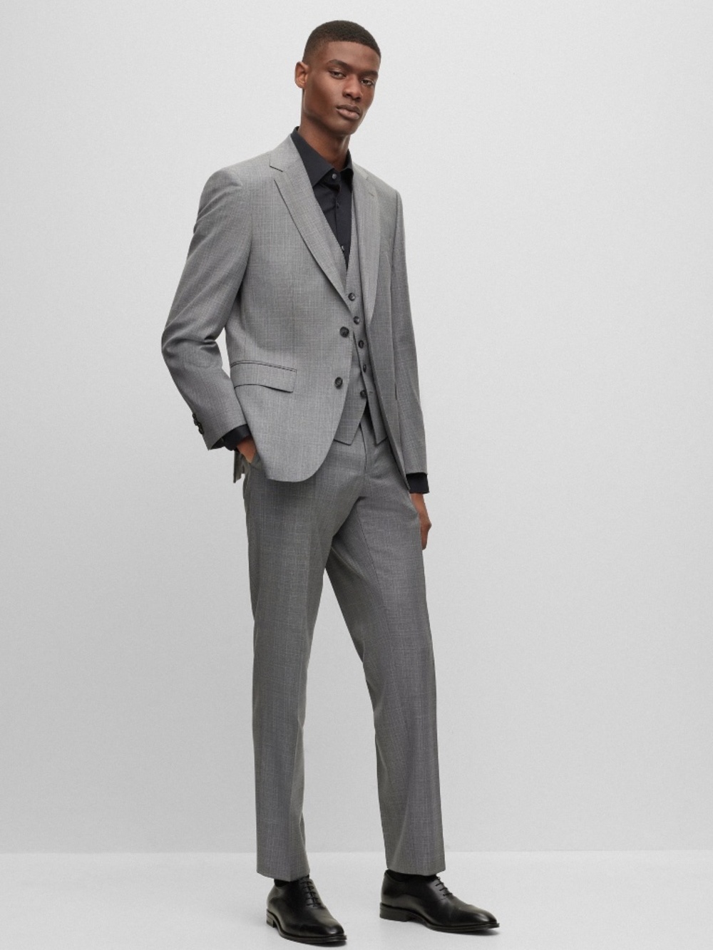 HUGO BOSS Regular-fit three-piece suit in virgin-wool
